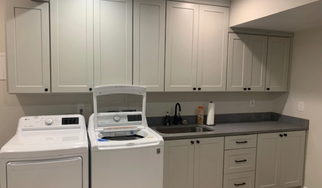 A laundry room equipped with a washer and dryer.