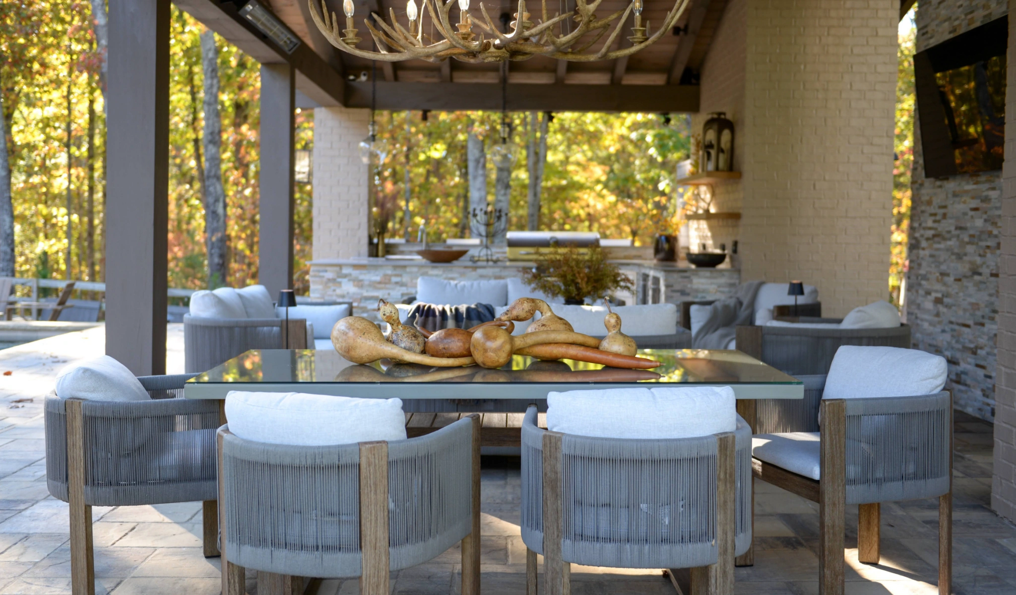 An outdoor dining area with a table and chairs perfect for enjoying meals in the open air.