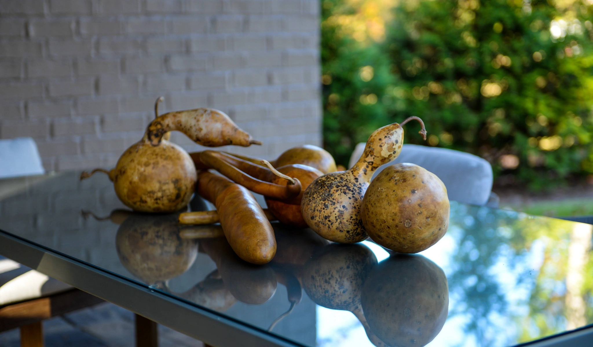 A glass table with decor.